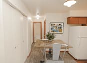 Thumbnail 5 of 18 - apartment dining room with a table and chairs