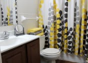 Thumbnail 8 of 17 - bathroom with a shower curtain and a toilet