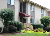 Thumbnail 11 of 17 - apartment building with a garden