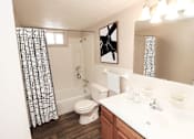 Thumbnail 10 of 23 - a bathroom with a toilet sink and bathtub