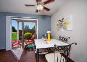 Thumbnail 1 of 14 - Dining Area with Attached Patio