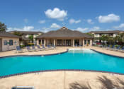 Thumbnail 25 of 34 - apartment complex with outdoor swimming pool