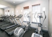 Thumbnail 8 of 34 - fitness center at Village at Juban Lakes
