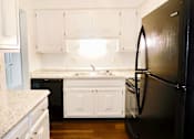 Thumbnail 5 of 12 - kitchen with appliances in Kettering, Ohio 