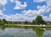 Thumbnail 17 of 23 - exterior of lamberton lake apartments in grand rapids michigan from the lake