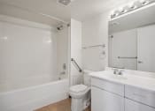 Thumbnail 6 of 29 - a bathroom with a sink toilet and a bath tub