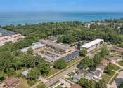 Thumbnail 20 of 25 - an aerial view of the campus with lake Michigan in the background