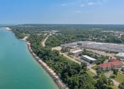 Thumbnail 19 of 25 - arial view of the campus with lake michigan the background