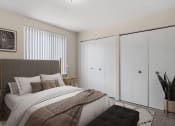 Thumbnail 5 of 25 - a bedroom with a bed and a closet