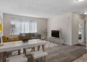 Thumbnail 1 of 25 - a living room with a white table and couch