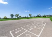 Thumbnail 12 of 15 - a basketball court at apartment community