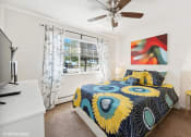 Thumbnail 4 of 15 - apartment bedroom with a ceiling fan