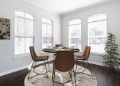 Thumbnail 4 of 33 - a dining room with big windows