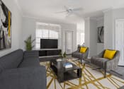 Thumbnail 3 of 33 - a living room with gray walls and a yellow and gray rug