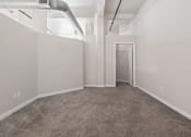Thumbnail 5 of 15 - bedroom with carpet and a door to a closet