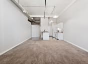 Thumbnail 2 of 15 - loft living room with white walls and a carpeted floor