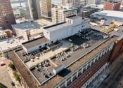 Thumbnail 13 of 15 - an aerial view of a large building in a city