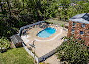Thumbnail 19 of 25 - A small pool surrounded by a white fence.