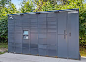 Thumbnail 9 of 18 - A grey utility box with the word "hub" on it.