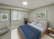 Thumbnail 7 of 18 - A bedroom with a large bed and a potted plant.