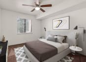 Thumbnail 6 of 18 - a bedroom with a ceiling fan and a window