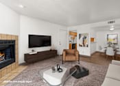 Thumbnail 2 of 25 - A living room with a fireplace and a flat screen TV.