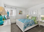 Thumbnail 7 of 12 - a bedroom with a window