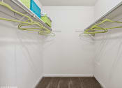 Thumbnail 8 of 12 - walk in closet in apartment