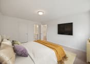 Thumbnail 7 of 16 - large primary bedroom area at miller west apartments