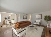 Thumbnail 3 of 16 - Connected living and dining room at miller west apartments