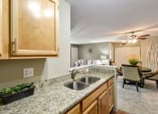 Thumbnail 6 of 32 - apartment kitchen with granite counter tops
