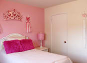 Thumbnail 7 of 12 - a pink bedroom with a white bed