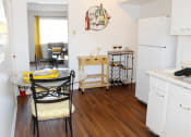 Thumbnail 3 of 12 - apartment kitchen with hardwood floor