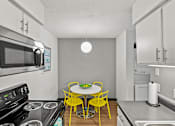 Thumbnail 5 of 25 - apartment kitchen with a stove and microwave