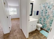 Thumbnail 12 of 24 - hardwood style flooring in Lima Townhome bathroom