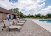 Thumbnail 17 of 24 - lounge chairs by pool at Northlake Village
