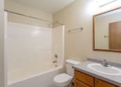 Thumbnail 9 of 32 - a bathroom with a sink toilet and shower