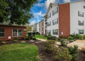 Thumbnail 13 of 15 - leasing office at apartment complex