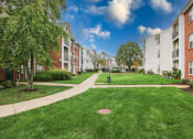 Thumbnail 14 of 15 - apartment community with beautiful landscaping