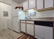 Thumbnail 3 of 15 - kitchen with Energy-Efficient Appliances including a refrigerator