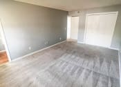 Thumbnail 8 of 18 - an empty room with a carpeted floor