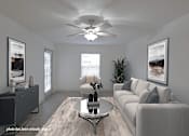 Thumbnail 12 of 20 - A living room with a grey couch, a coffee table, and a ceiling fan.
