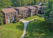 Thumbnail 21 of 23 - an aerial view of an apartment complex with walkways and balconies