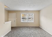 Thumbnail 2 of 16 - apartment living room with a window