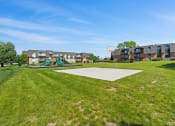 Thumbnail 15 of 33 - basketball court at apartment community