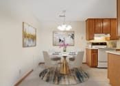 Thumbnail 1 of 33 - apartment kitchen and dining room with a table
