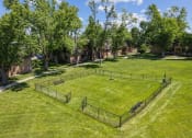 Thumbnail 16 of 33 - dog park with fence at apartment complex