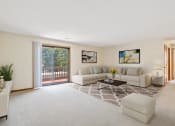 Thumbnail 4 of 33 - living room with a sliding glass door to balcony
