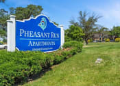 Thumbnail 22 of 33 - welcome sign at Pheasant Run Apartments