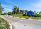 Thumbnail 21 of 33 - the sign for Pheasant Run apartments